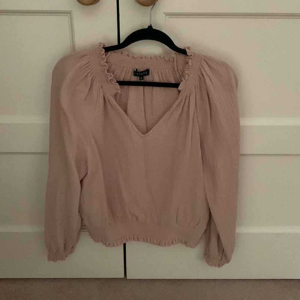 Lovely light pinky peach blouse with smocked neckline, cuffs and hem